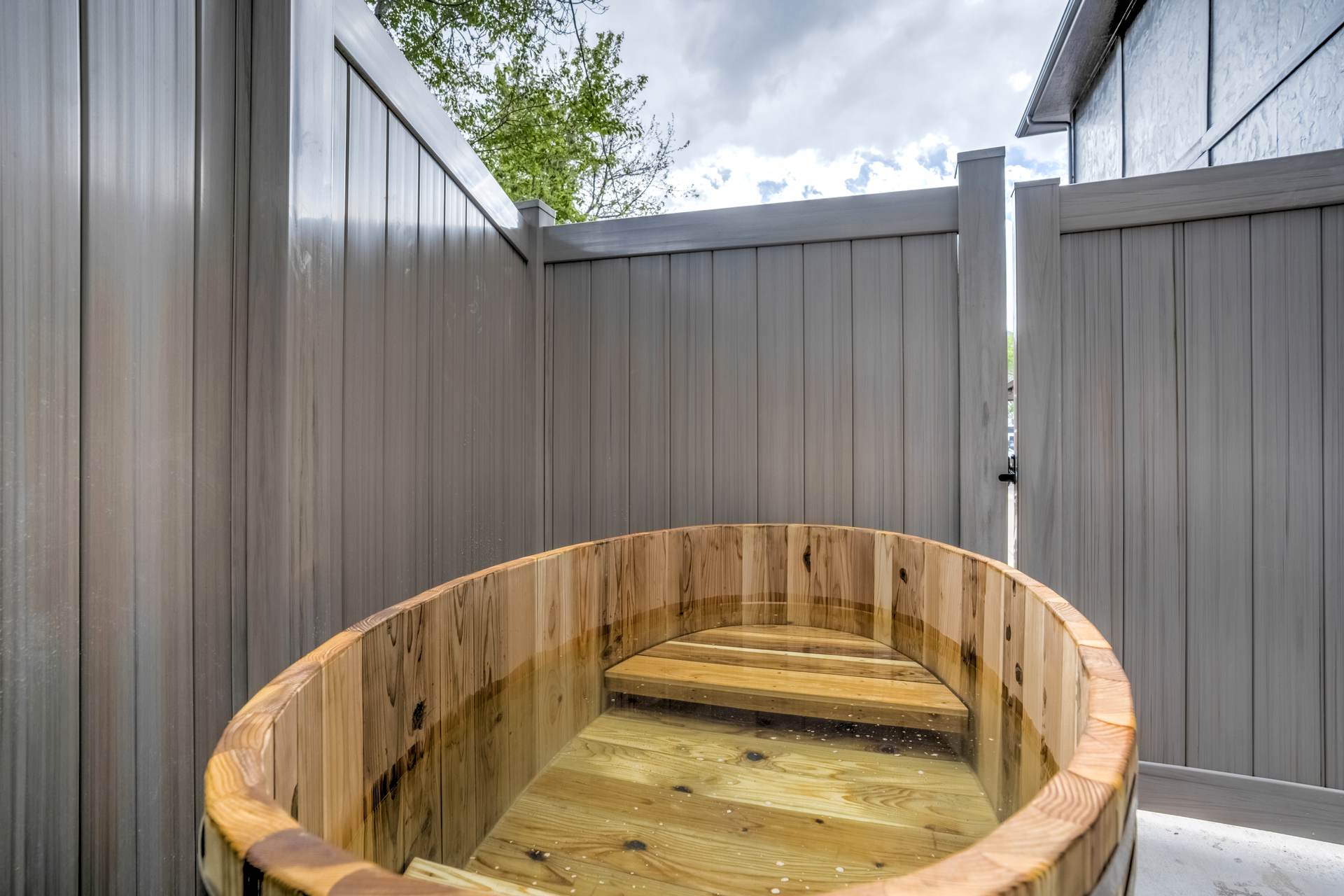 Private cedar cold plunge tub at The Outrider Hotel in Manitou Springs